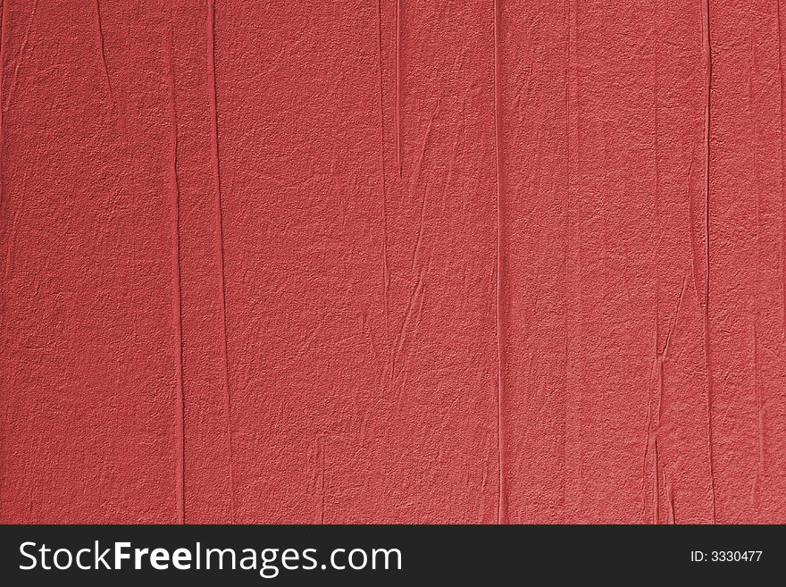 Red wallpaper texture close up