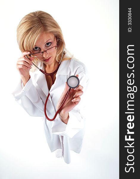 Young crazy doctor with glasses. She is on a white background.