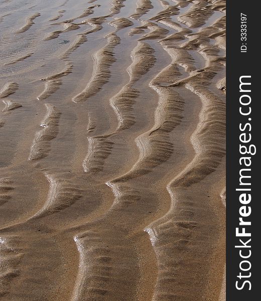 Wet sand on English (Cornwall) beach. Wet sand on English (Cornwall) beach