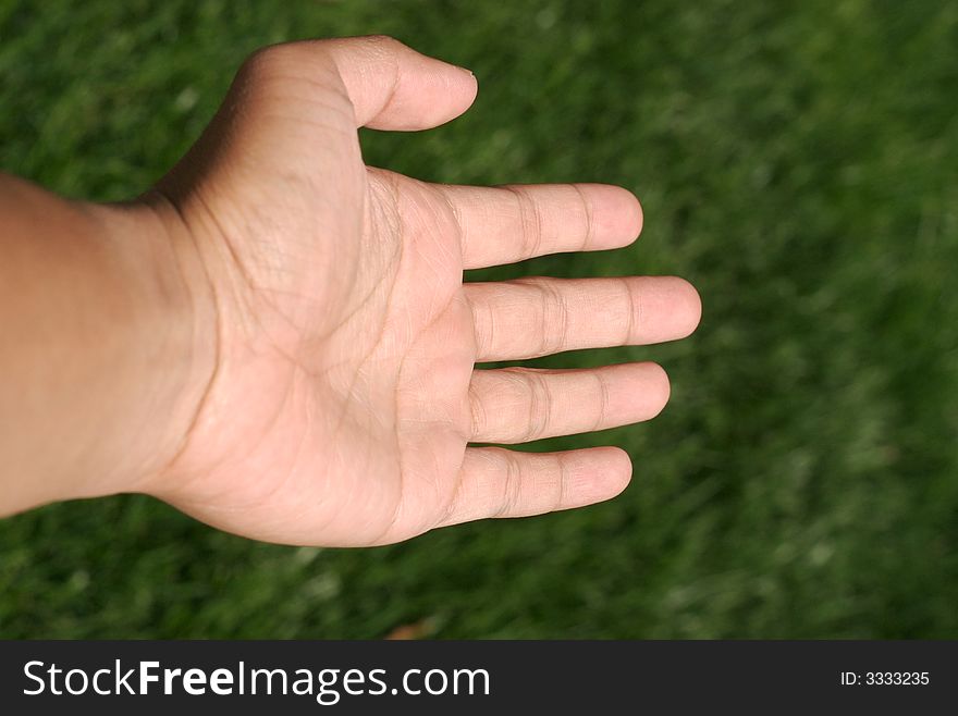 Man's fist on a blurred background. Man's fist on a blurred background