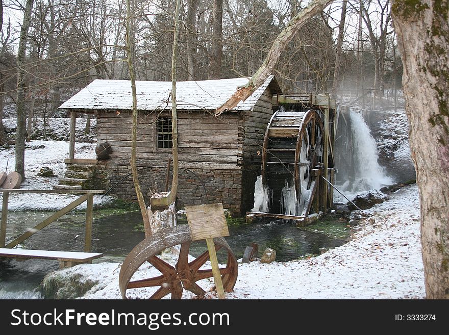 A snowy scene of a mill. A snowy scene of a mill