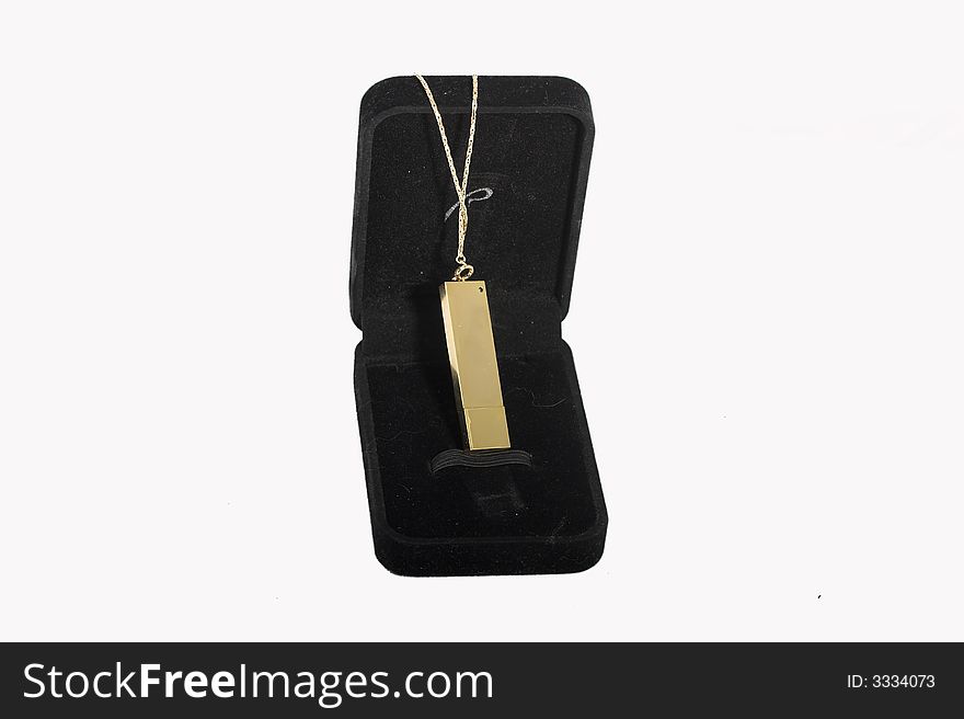 Black velvet casket with a golden suspension bracket on a chain. Black velvet casket with a golden suspension bracket on a chain