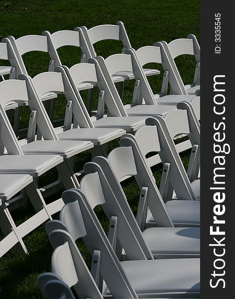 Chairs in semi-circle for a wedding ceremony. Chairs in semi-circle for a wedding ceremony