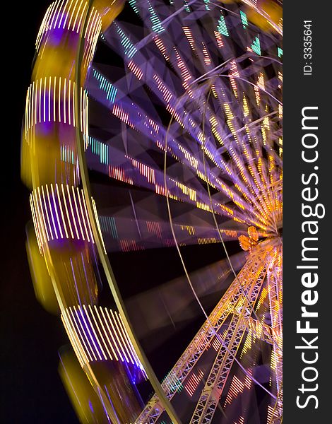 Motion-blurred ferris wheel. Taken during a funfair in Nijmegen. Motion-blurred ferris wheel. Taken during a funfair in Nijmegen