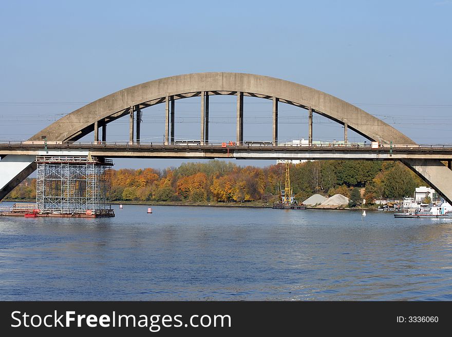 The ferroconcrete railway bridge over the river.