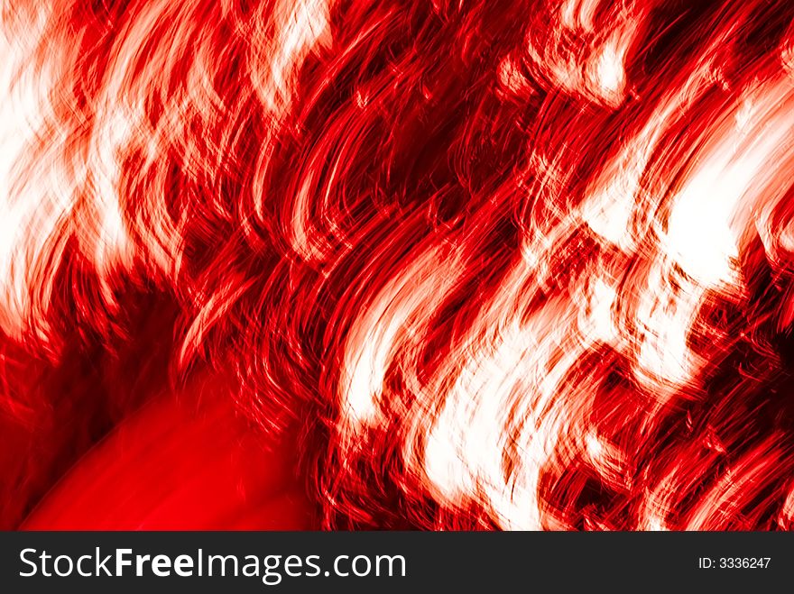 An abstract image created by using a slow shutter speed while moving and/or adjusting the focal length of the lens.  Colors added and/or adjusted afterwards. An abstract image created by using a slow shutter speed while moving and/or adjusting the focal length of the lens.  Colors added and/or adjusted afterwards.
