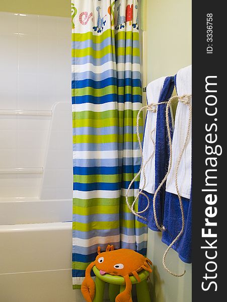 A colorfully decorated child's bathroom in an aquatic theme. A colorfully decorated child's bathroom in an aquatic theme