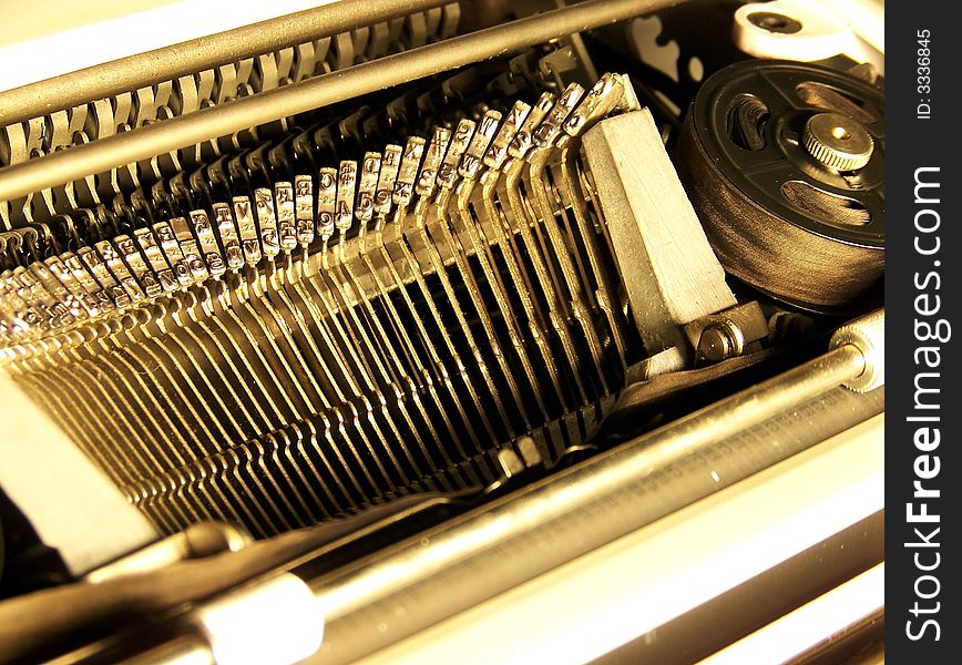 Typebars of an old typewriter.