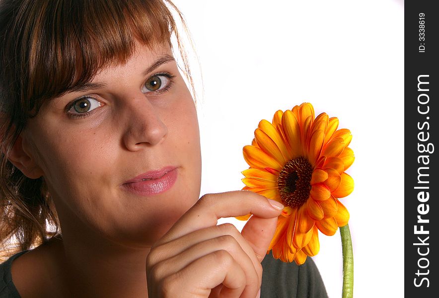 A young woman is picking flower paddels!. A young woman is picking flower paddels!