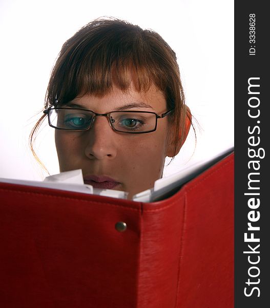 A young student is reading a book. A young student is reading a book.