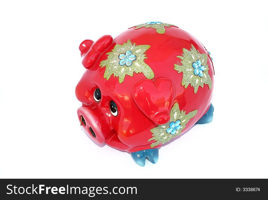 Red piggy bank isolated on the white.