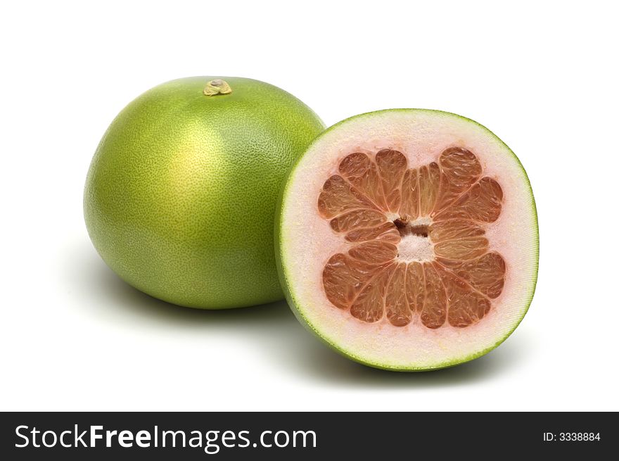 Two fresh pomelo on white