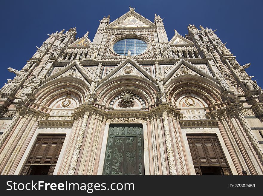 Facade of the cathedral in siena, italy