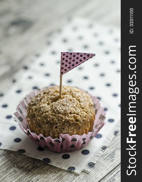 Pumpkin Cupcake On Old Table