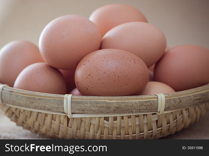 Basket with eggs on sackcloth