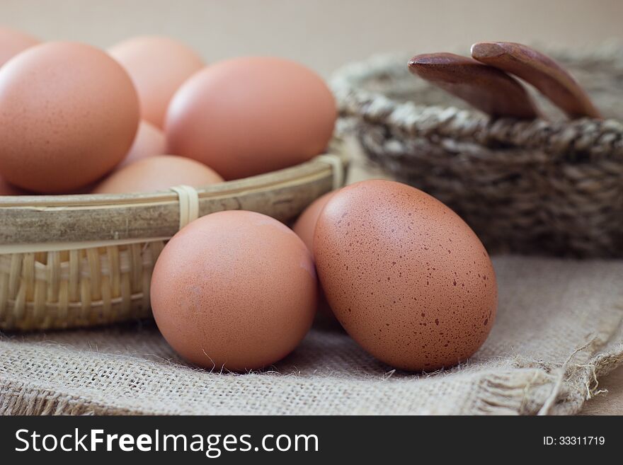 Basket with eggs on sackcloth