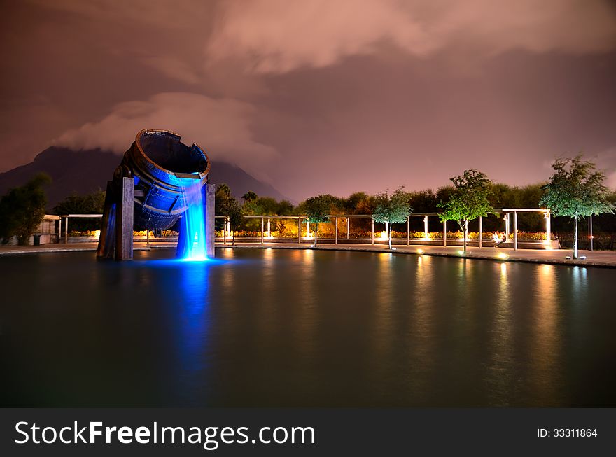 Foundry Tray on an artificial lake and a Mountain in the background