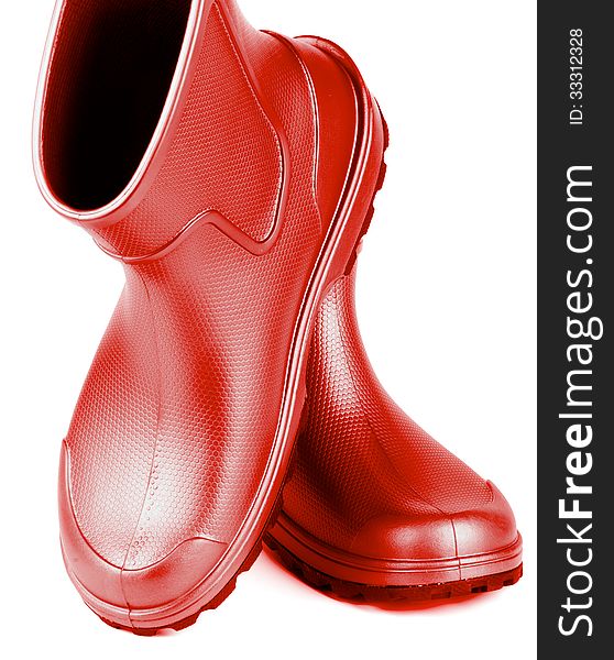 Pair of Comfortable Red Rubber Boots isolated on white background