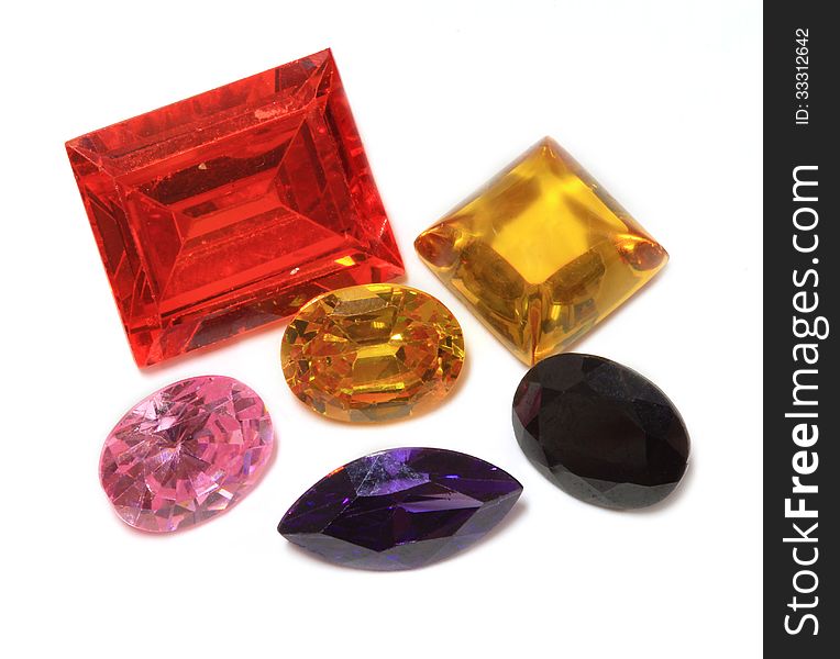 Various color , shape and size of Gemstone on white background