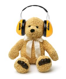 Teddy Bear Sitting With Hear Protectors Stock Image Teddy Bear Sitting With Hear Protectors Stock Image