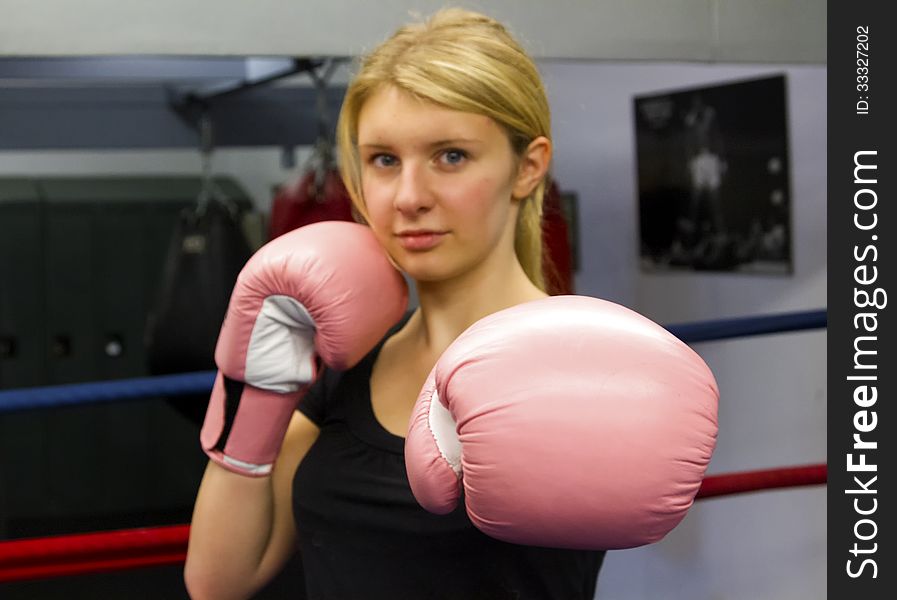 Punch from a young girl boxing. Punch from a young girl boxing