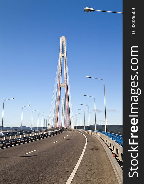 Big suspension bridge in Vladivostok in beams of a bright sun