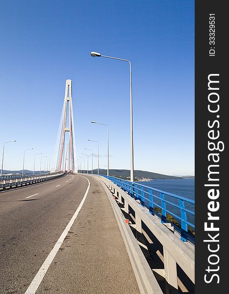 Big suspension bridge in Vladivostok in beams of a bright sun