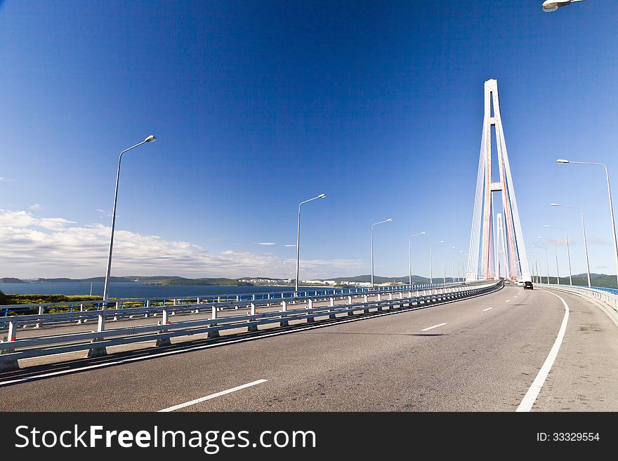 Big suspension bridge in Vladivostok in beams of a bright sun