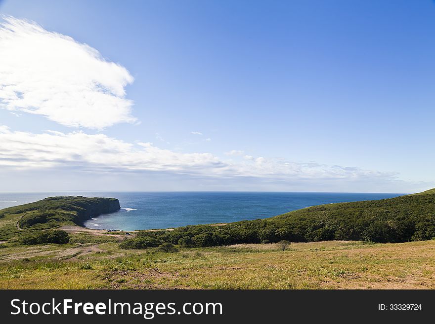 Sea landscape in the bright sunny day under the blue sky