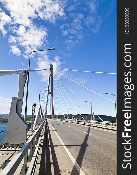 Big suspension bridge in Vladivostok in beams of a bright sun