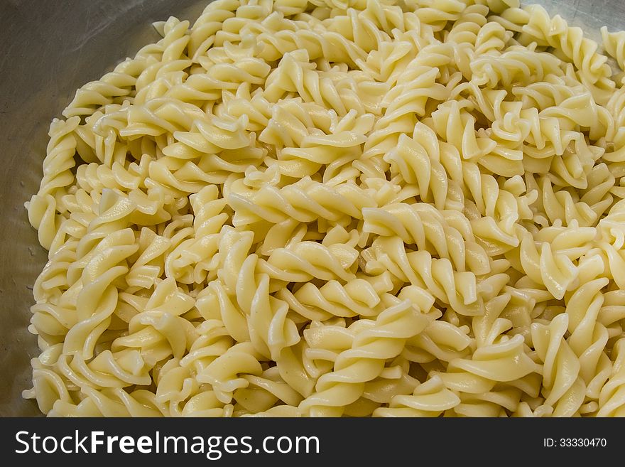 Boiled Fusilli pasta, traditional Italian cuisine.