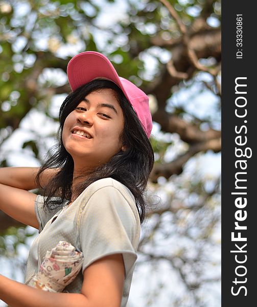 Portrait of a young asian beautiful woman on the nature