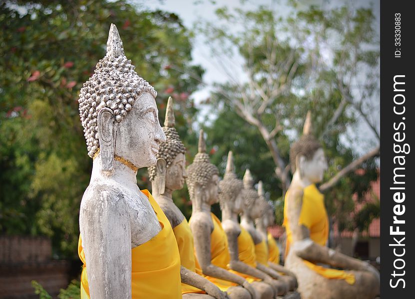 Ancient Buddha statues at Wat Yai Chai Mongkol in Ayutthaya, Thailand