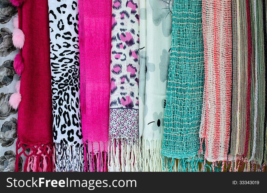 The collection of beautiful colorful scarves