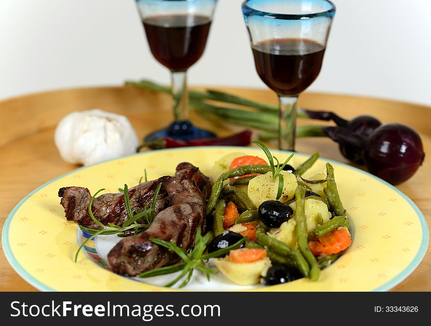 italian plate of grilled vegetables with lamb