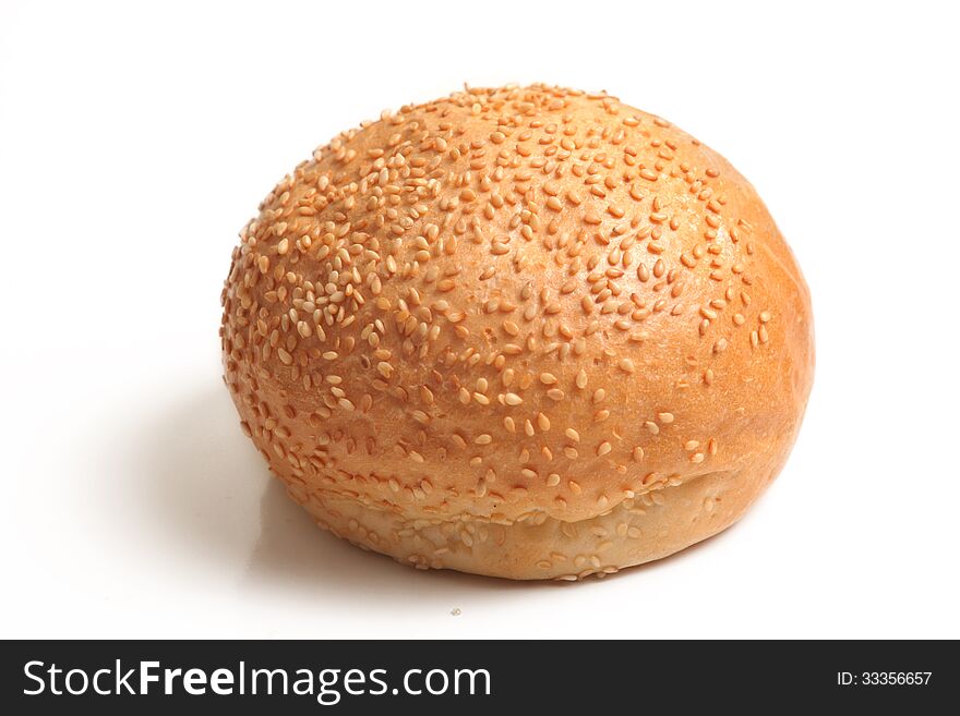 Bread with sesame on a white background. Bread with sesame on a white background