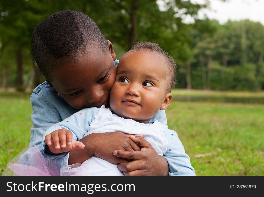 Happy little children are having a nice day in the park. Happy little children are having a nice day in the park