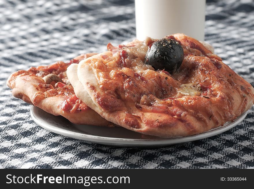 Photo of delicious slice of pizza with olive