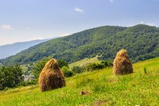 Haystacks On Hillside Near The Village Royalty Free Stock Image Haystacks On Hillside Near The Village Royalty Free Stock Image