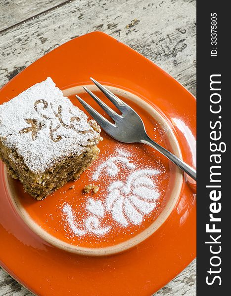 Pumpkin Cake On Orange Plate And Fork