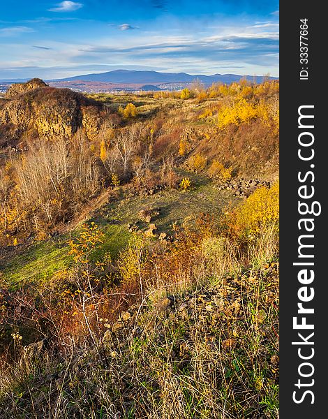 Valley and far away mountain range in autumn. horizontal