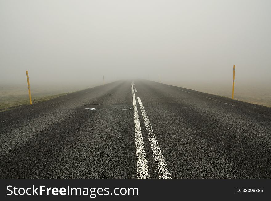 Infinite Icelandic road through the mist. Infinite Icelandic road through the mist