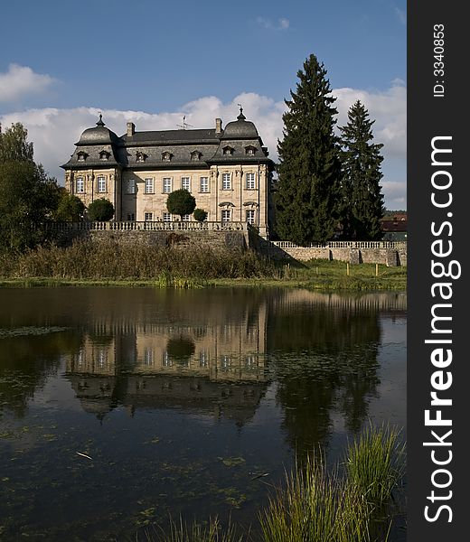 German baroque castle ar a pond. German baroque castle ar a pond