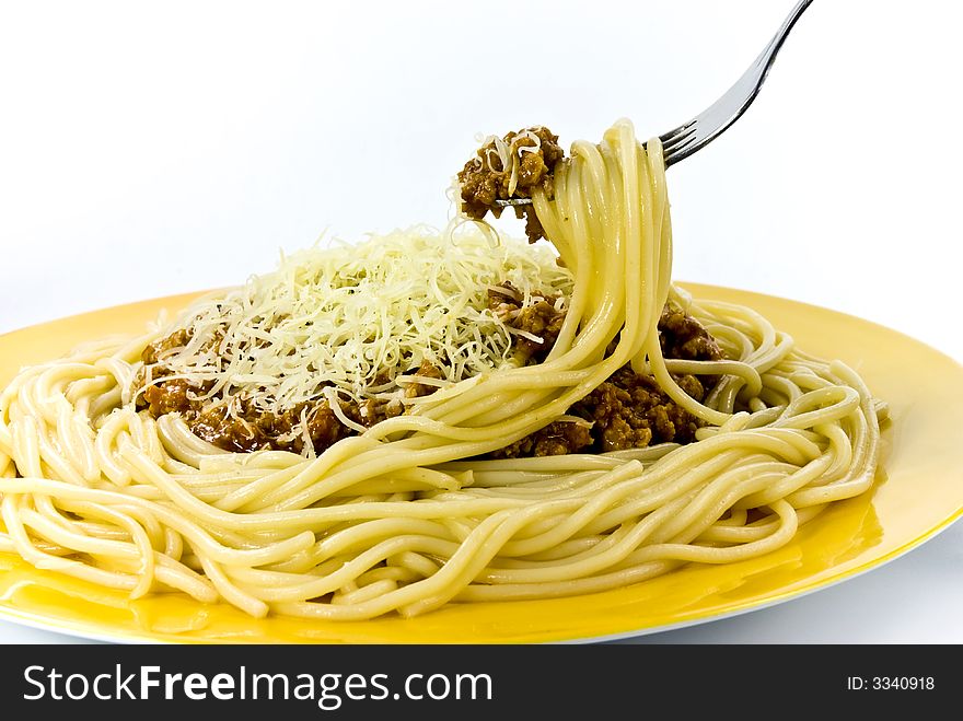 Plate of spaghetti with parmesan cheese.