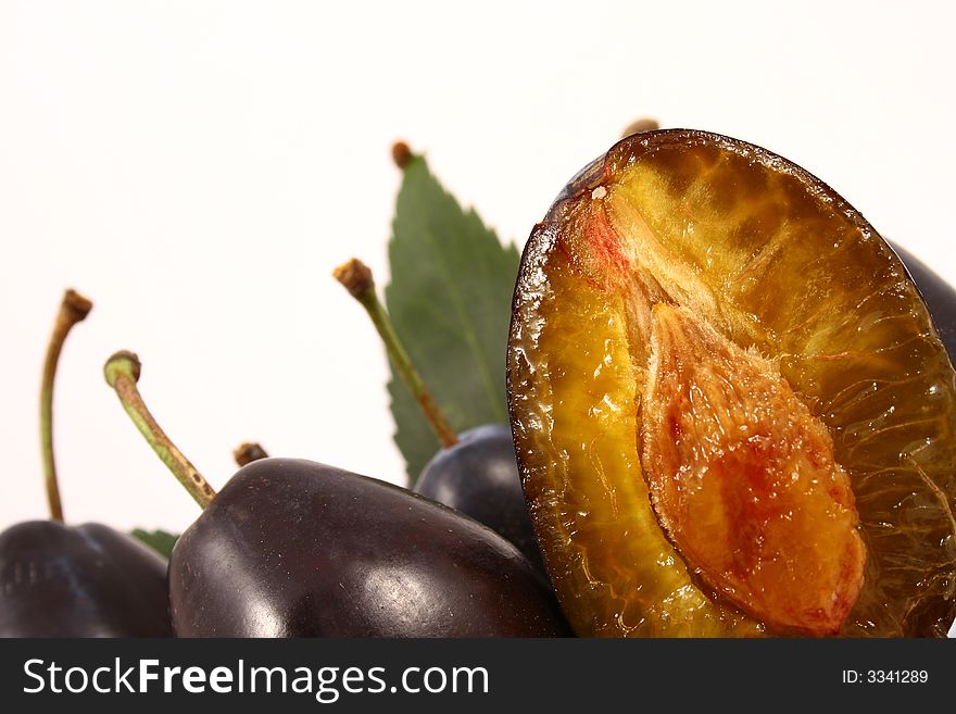 Violet Plumbs isolated on white background-fruits