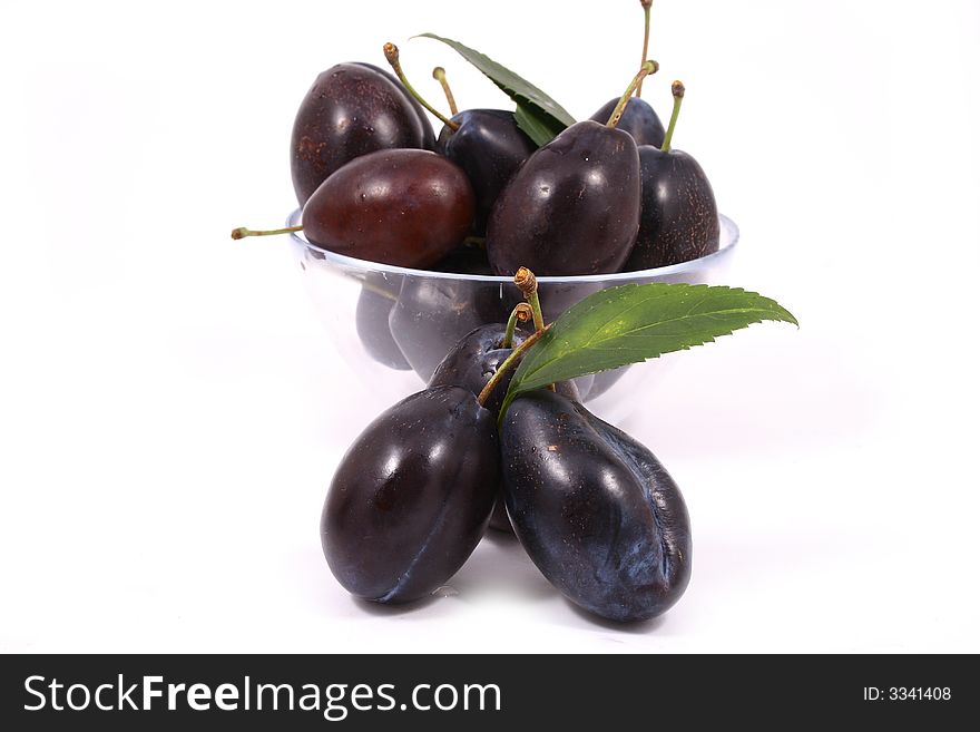 Violet Plumbs isolated on white background-fruits