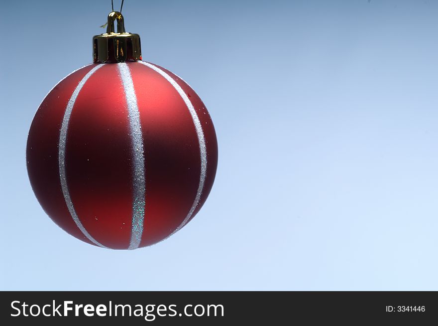 Christmas tree decoration ball on bluebackground. Christmas tree decoration ball on bluebackground.