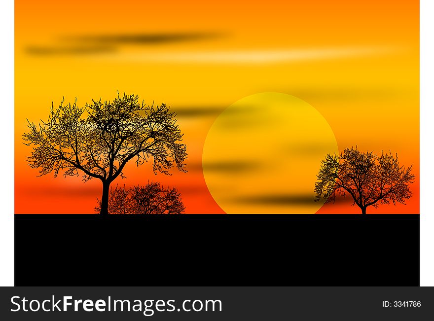 Red and yellow sunset with trees silhouettes