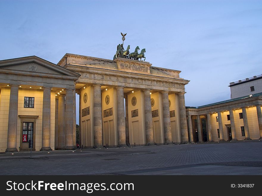 Brandenburg Gate in Berlin in the early morning in Autumn. Brandenburg Gate in Berlin in the early morning in Autumn