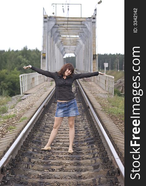 Girl on the railway bridge